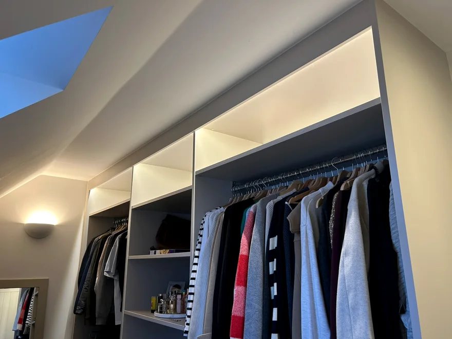 Concealed LED strip lighting in a fitted dressing room