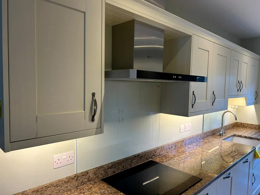 Under-cabinet lighting installed in a fitted kitchen